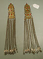 Pair of Long Temple Pendants, Silver; fire-glided and chased, with openwork, table-cut carnelians, loop-in-loop chains, bells, and embossed pendants