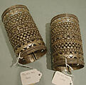 Armband, One of a Pair, Silver with openwork, twisted wire and stamped bead decoration