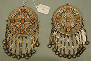 Pectoral Disc Ornament, One of a Pair, Silver with gilt applied decoration, openwork, decorative wire, connecting links with applied decoration, cone shaped and spherical bells, and table cut carnelians