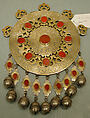 Pectoral Disc Ornament, One of a Pair, Silver; fire-gilded with engraving/punching, stylized floral terminations, openwork decoration, pendants, silver twisted wire chains, table cut carnelians, and bells/beads.