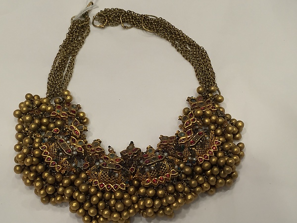 Necklace with Embellished Amulet Forms