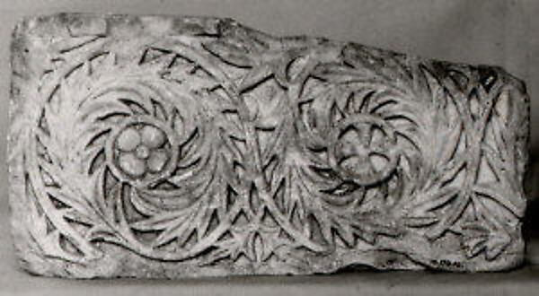 Fragment of a Frieze with Scrolls Enclosing a Rosette and a Cross