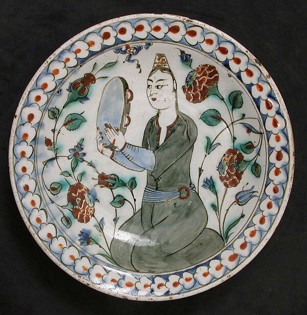 Plate Depicting a Woman Playing Tambourine