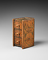 Three-drawer miniature chest in book form, decorated in art nouveau style with, PR monogram