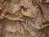 Dusasa II, El Anatsui (Ghanaian, born Anyako, 1944), Found aluminum, copper wire, and plastic disks