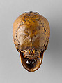 Prayer Bead in the Form of a Skull with the Entry into Jerusalem and the Carrying of the Cross, Fruitwood, German (?)