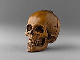Prayer Bead in the Form of a Skull with the Entry into Jerusalem and the Carrying of the Cross, Fruitwood, German (?)