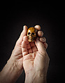 Prayer Bead in the Form of a Skull with the Entry into Jerusalem and the Carrying of the Cross, Fruitwood, German (?)