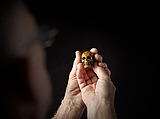Prayer Bead in the Form of a Skull with the Entry into Jerusalem and the Carrying of the Cross, Fruitwood, German (?)
