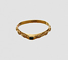 Stirrup Ring, Gold and emerald, British
