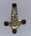 Bow Brooch, Gilded silver and garnets, Frankish