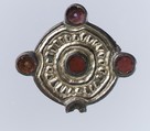 Whorl-Shaped Brooch, Gilded silver, glass paste, and remnant of iron pin, Frankish