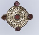 Whorl-Shaped Brooch, Gilded silver, glass paste, and remnant of iron pin, Frankish