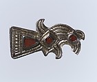 Bird-Shaped Brooch, Gilded silver, garnets with patterned foil backings and iron spring/pin, Frankish