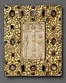 Panel with Byzantine Ivory Carving of the Crucifixion, Silver-gilt with pseudo-filigree, glass, crystal, and sapphire cabochons, ivory on wood support, Byzantine (ivory); Spanish (setting)