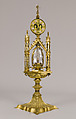 Reliquary of Mary Magdalene, Gilded copper, gilded silver, rock crystal, verre églomisé, and a tooth (possibly human), North Italian