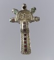 Bow Brooch, Silver, gilt and cast; garnet with unpatterned foil backing; bone; iron spring/pin, Frankish