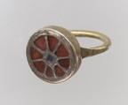 Finger Ring, Gold (ring and setting); gilded silver (central inlaid disc), Frankish