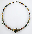 Beaded Necklace, Glass, stone, shell, amber,  3 copper alloy coins,, Frankish
