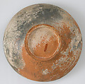 Bowl with Ornamented Rosette, Fired red earthenware, greenish/gray cream slip, clear glaze, Byzantine