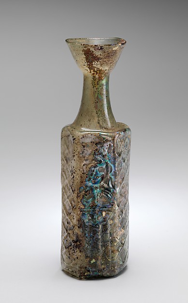 Yellow-Green Hexagonal Glass Bottle with a Stylite Saint