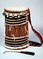 Dundun (iya ilu), Wood, cloth, hide, metal, Yoruba