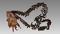 Dew Claw Strung Rattle, Dewclaws, leather, rawhide, brass, eagle's claw and feathers, deer's tail, Native American (Osage, Wazhazhe)