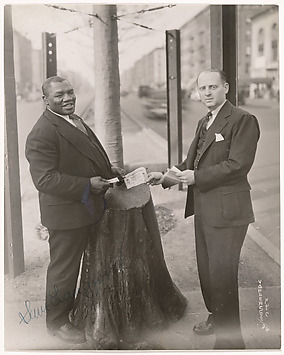 Sam Langsford and Friend Holding Grand National Fight Ticket, James Van Der Zee  American, Gelatin silver print