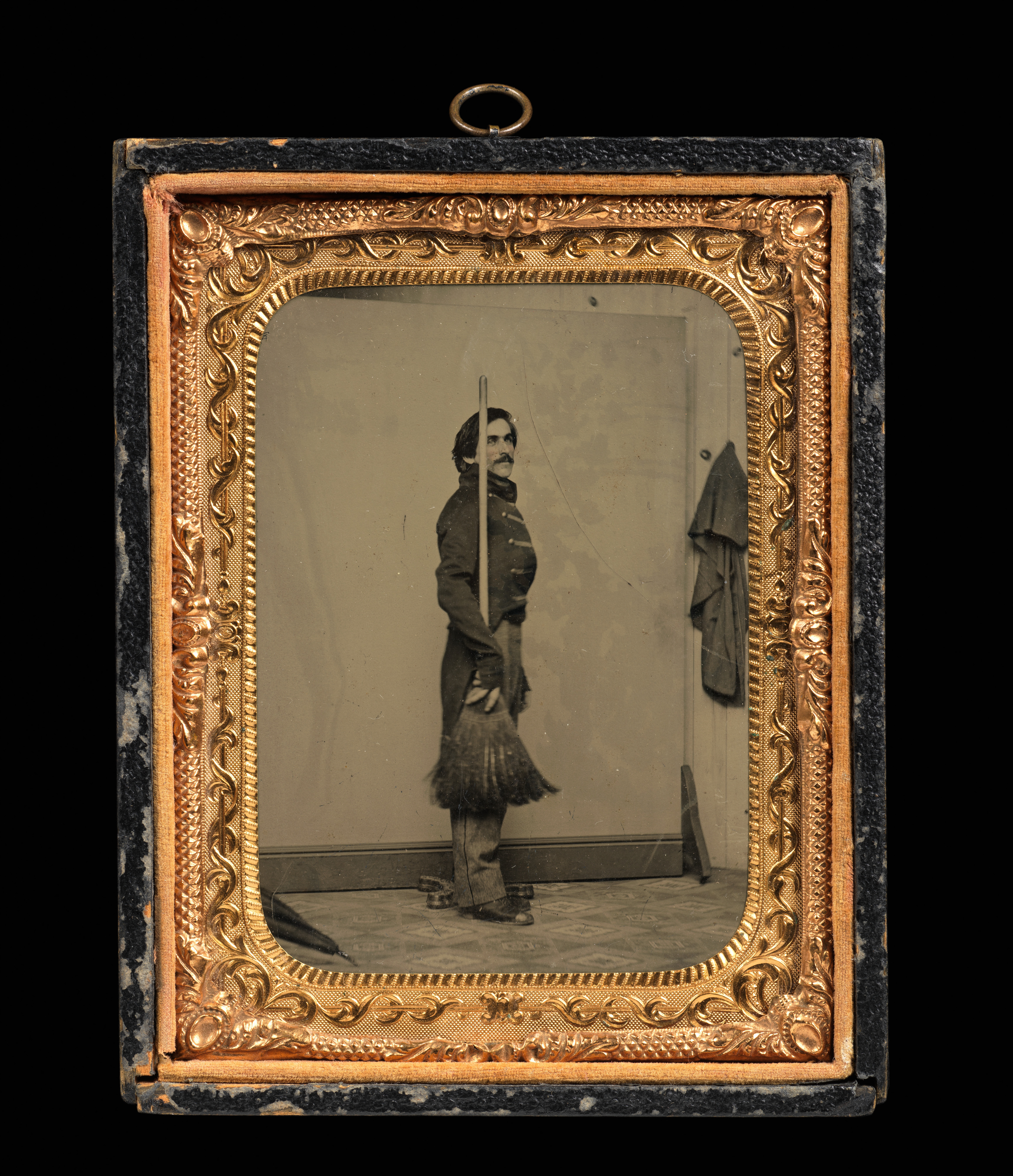 [Union Civil War Soldier Posed in Studio with Broom in Place of Rifle]