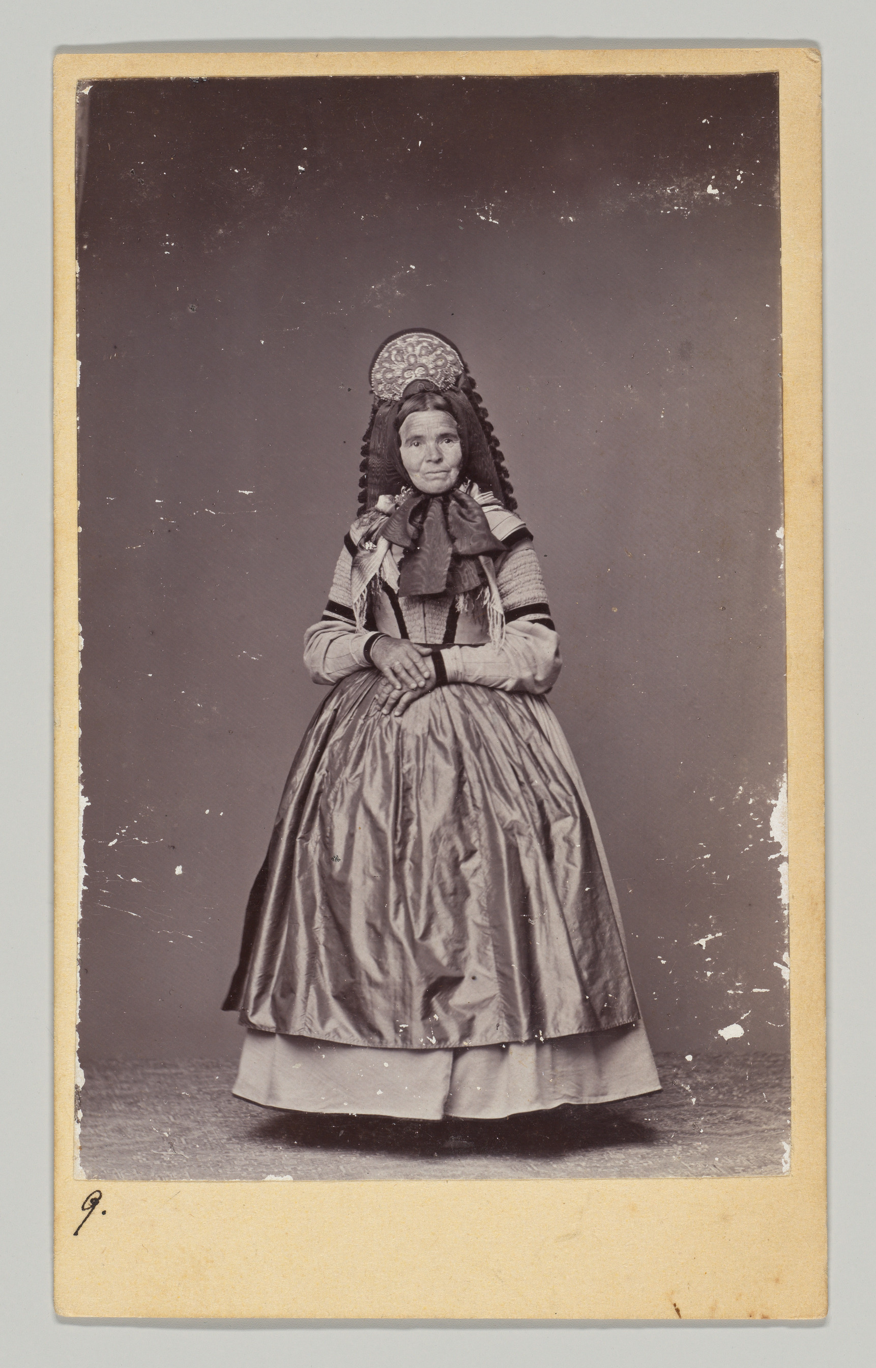 [Woman in Regional Dress, Seen From Front and Back]