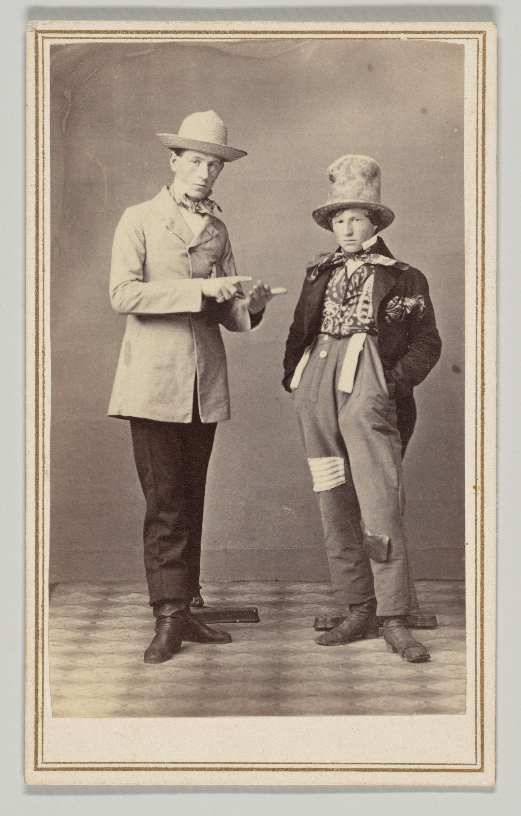 [Two Men Wearing Hats]