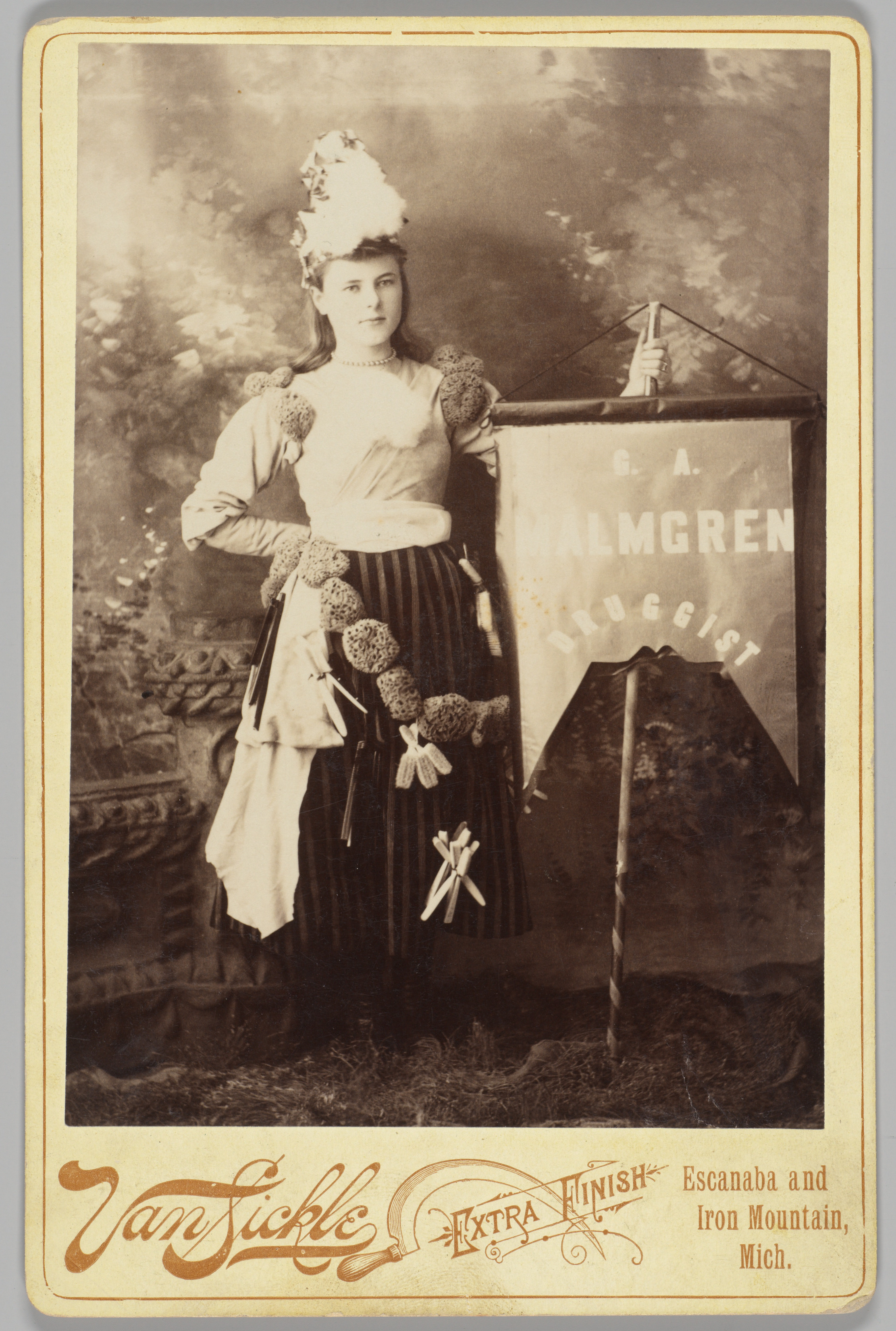 [Merchants' Carnival Portrait: G. A. Malmgren Druggist, Escanaba and Iron Mountain, Michigan]