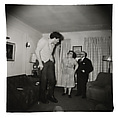 A Jewish giant at home with his parents in the Bronx, N.Y., Diane Arbus  American, Gelatin silver print