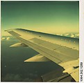 [Wing and Clouds From Plane Window], Walker Evans  American, Instant internal dye diffusion transfer print (Polaroid SX-70)