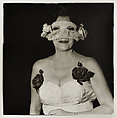 Lady at a masked ball with two roses on her dress N.Y.C. , Diane Arbus  American, Gelatin silver print