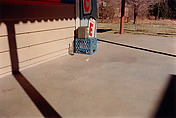 Untitled (Bottle on Cement Porch), William Eggleston  American, Dye transfer print