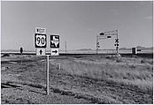 Southern Pacific Transportation Co. and Amtrak's Sunset Limited, Railroad Crossing, Jefferson Davis County, Texas, Lothar Baumgarten  German, Gelatin silver print