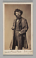 [Studio Portrait: Self-Portrait Wearing Plaid Pants and Overcoat], Pierre Petit (French, Aups 1832–1909 Paris), Albumen silver print