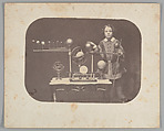 [Child with Orrery, Tellurian, and Other Astronomical Instruments], Unknown, Salted paper print from paper negative