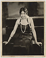 [Woman in Evening Dress Seated on Piano Bench], James Van Der Zee  American, Gelatin silver print
