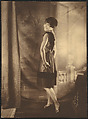 [Woman, Standing, Looking over Shoulder], James Van Der Zee  American, Gelatin silver print