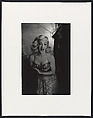 Blonde female impersonator in a sequined dress making cleavage, N.Y.C., Diane Arbus  American, Gelatin silver print