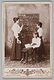 [Teacher with Two Students near Chalkboard], Frank Woodward  American, Gelatin silver print