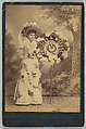 [Merchants' Carnival Portrait: Philips & McClure, Augusta, Illinois], N. McDonald  American, Albumen silver print