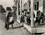 [Haircutting in Front of General Store and Post Office on Marcella Plantation, Mileston, Mississippi], Marion Post Wolcott  American, Gelatin silver print