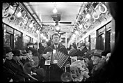 [Four 35mm Film Frames: View Down Subway Car: Accordionist Performing in Aisle, Newspaper Vendor in Aisle, New York City], Walker Evans (American, St. Louis, Missouri 1903–1975 New Haven, Connecticut), Film negative