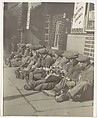 [Workers Eating Lunch, Seated on Sidewalk, New York], Walker Evans  American, Gelatin silver print