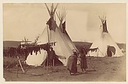 [Native American Woman in Camp with Racks of Drying Meat], Unknown, Albumen silver print from glass negative