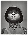 A fifteen-year-old stands at attention before his company leaves for the front and the decisive Sino-Japanese battles of the year. Hankow, March, Robert Capa  American, born Hungary, Gelatin silver print