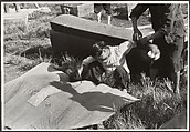 A woman mourns her husband, killed in the battle of Taierhchwang, April, Robert Capa  American, born Hungary, Gelatin silver print